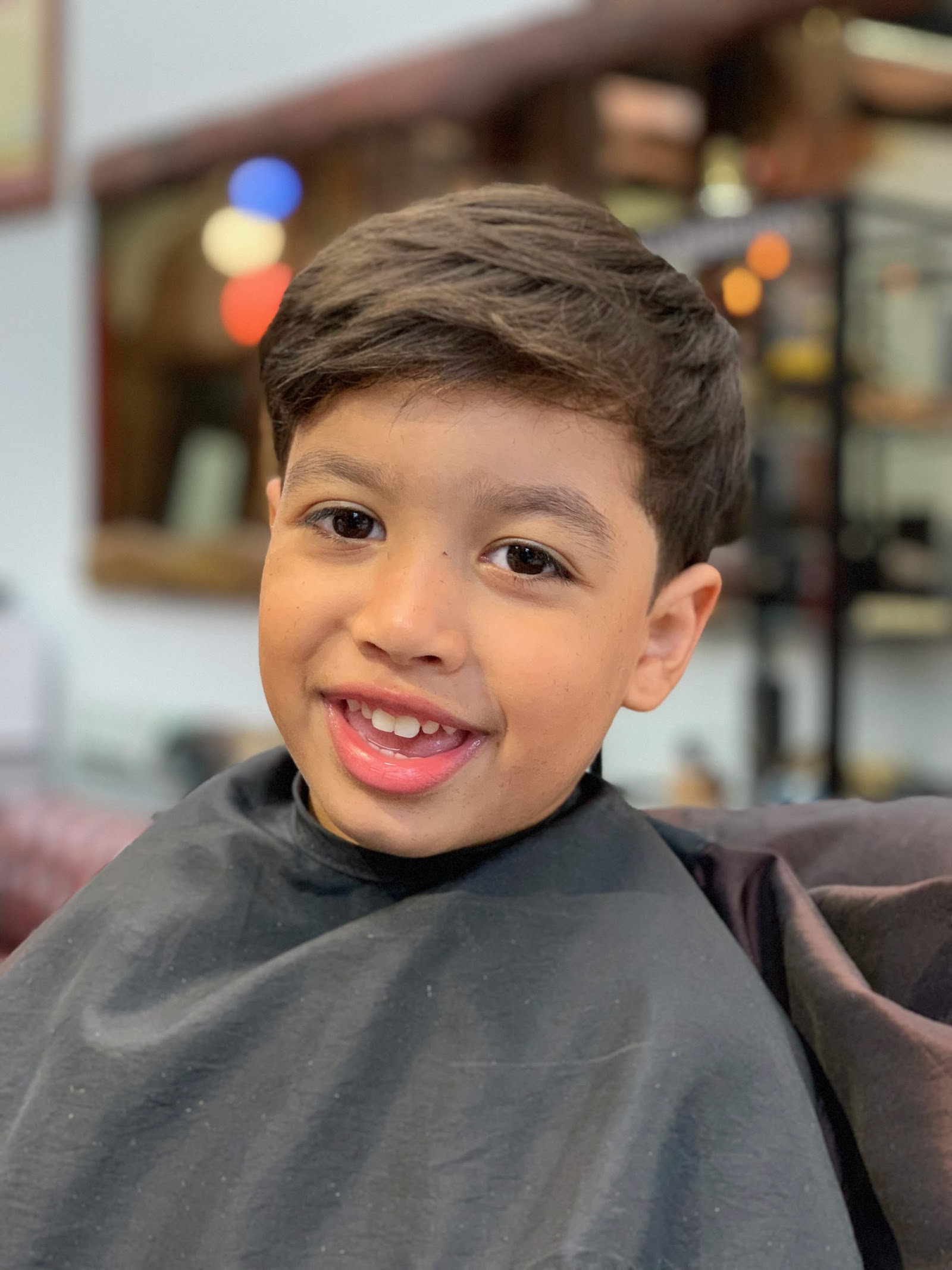Young client with a fresh haircut at vivo hairstudio